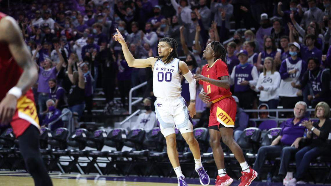 Kansas State guard Mike McGuirl celebrates after making a three-pointer against Pittsburg State at Bramlage Coliseum.