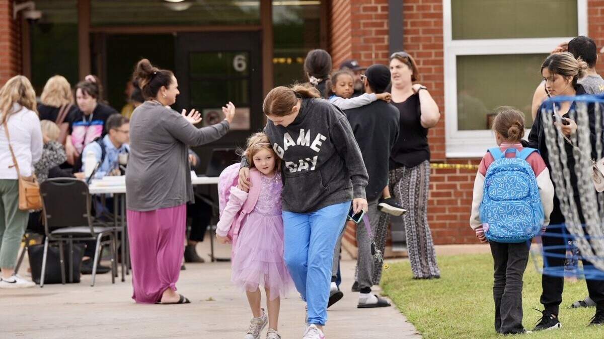 Parents pick up their kids from Cessna Elementary School on Monday, Sept. 23, 2024 after a nearby shooting put the school on lockdown.