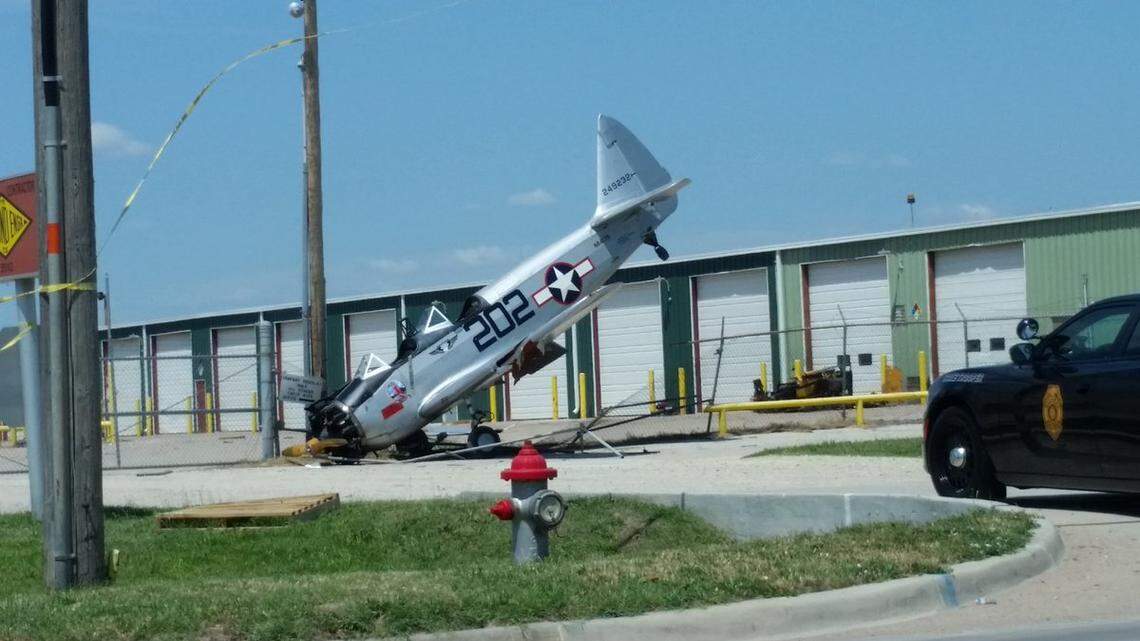 A World War II plane that had just finished flying over area ceremonies and cemeteries for Memorial Day crash-landed at Wichita's Westport Airport.