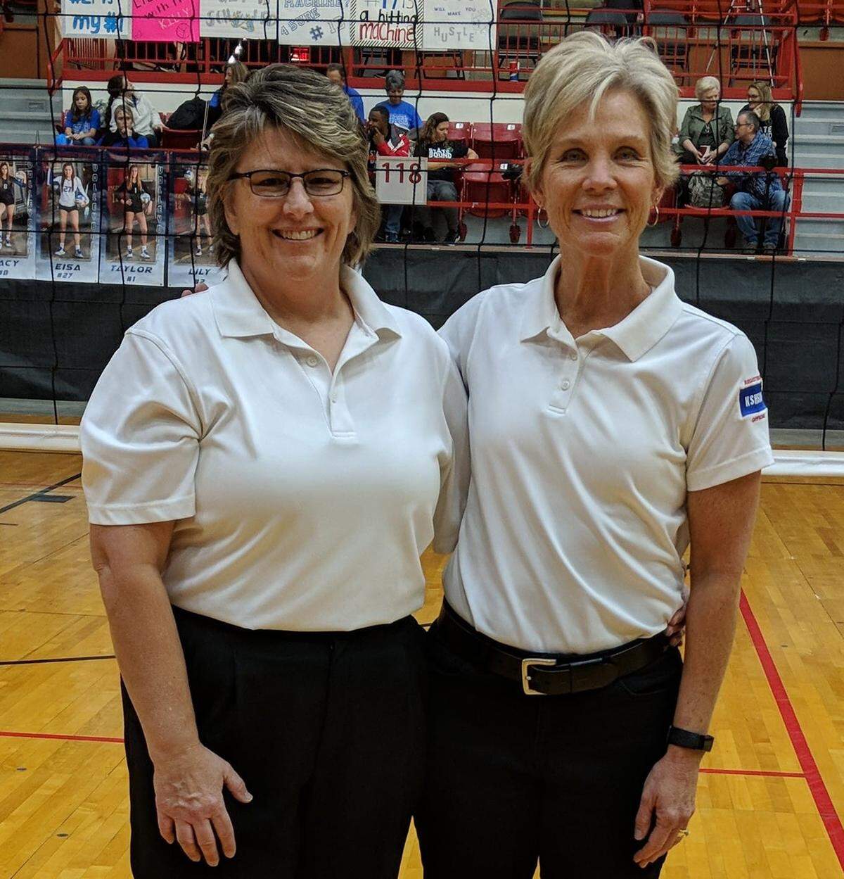 Donna Lee (right) was named the top high school volleyball official in 2019.