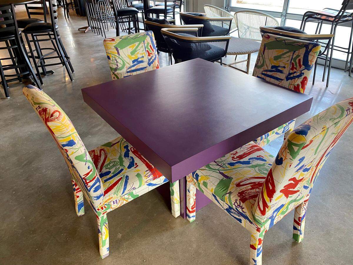 A table custom-made in the 1980s is one of the ’80s deco pieces that fills the new bar Douglas Social.