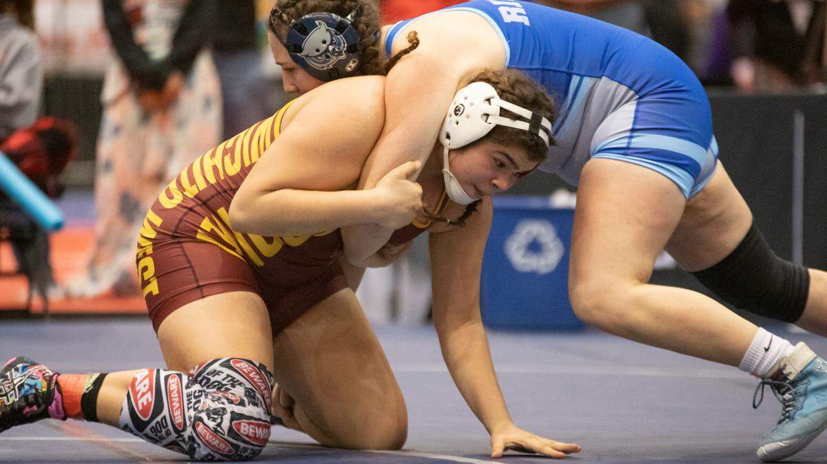 Wichita West’s Dru Johnson wrestles Olathe West’s Makayla Rivera at 6-5A girls state wrestling on Thursday.
