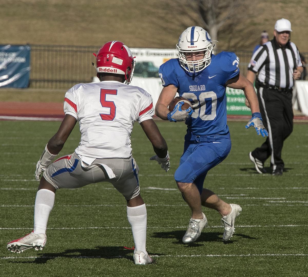 Benjamin Bannister #30 of Goddard tried to get past Jaylen Scruggs #5 of Bishop Miegein the Kansas Class 4a championship Saturday, November 24, 2018 at Topeka Hummer complex. Bishop Miege won the championship 69-31