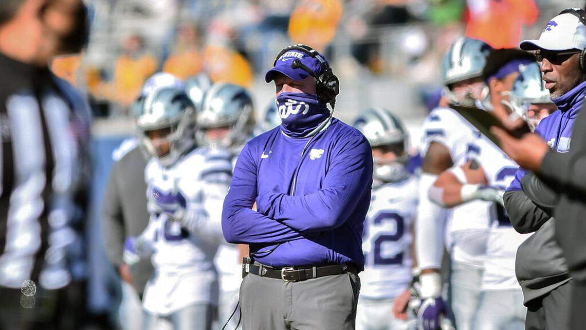 Kansas State head coach Chris Klieman looks on during their game against West Virginia during an NCAA college football game, Saturday, Oct. 31, 2020, in Morgantown, W.Va. (William Wotring/The Dominion-Post via AP)