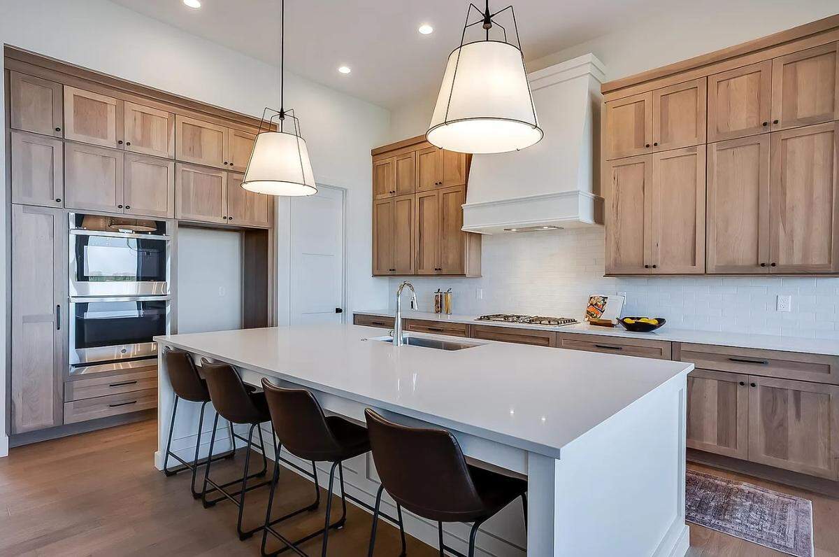 Bar seating adorns the kitchen of the home for sale at 4620 N. Ridge Port St. in Wichita.