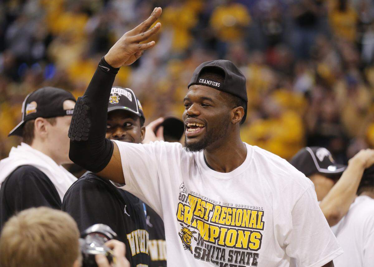 Wichita State forward Chadrack Lufile (0) celebrates after beating Ohio State in the 2013 regional final at Staples Center in Los Angeles.