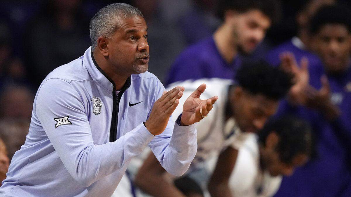 Kansas State head coach Jerome Tang cheers on his team during the first half of an NCAA college basketball game Kansas City Thursday, Nov. 17, 2022, in Manhattan, Kan. (AP Photo/Charlie Riedel)