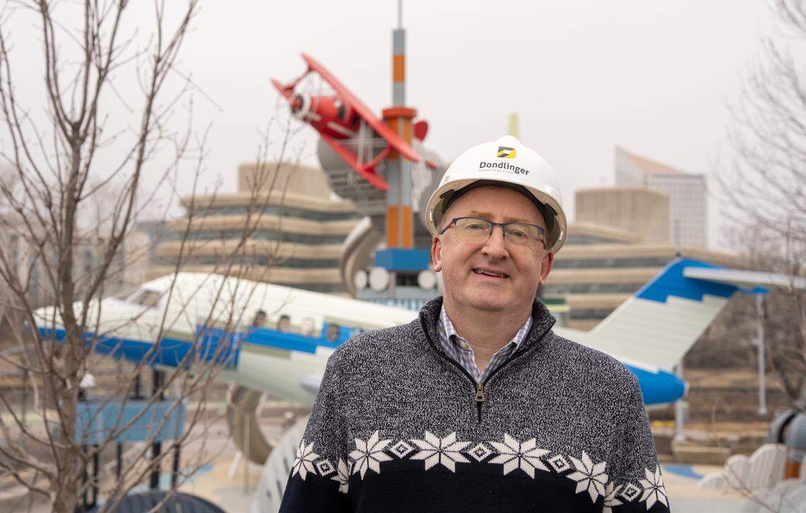 Exploration Place president and CEO Adam Smith stands near the Textron Aviation Flight Adventure. It’s one of 10 playgrounds at the children’s museum’s new Adventure Playscape and includes models of a Cessna Citation Longitude jet and a Beech Staggerwing, a 1930s biplane.