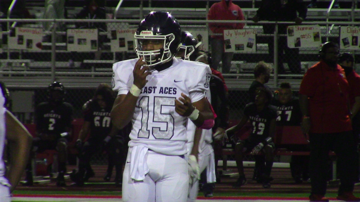 Behind quarterback DaeOnte Mitchell, East pulled off a 30-20 shocking victory over Kapaun Mt. Carmel on Friday.