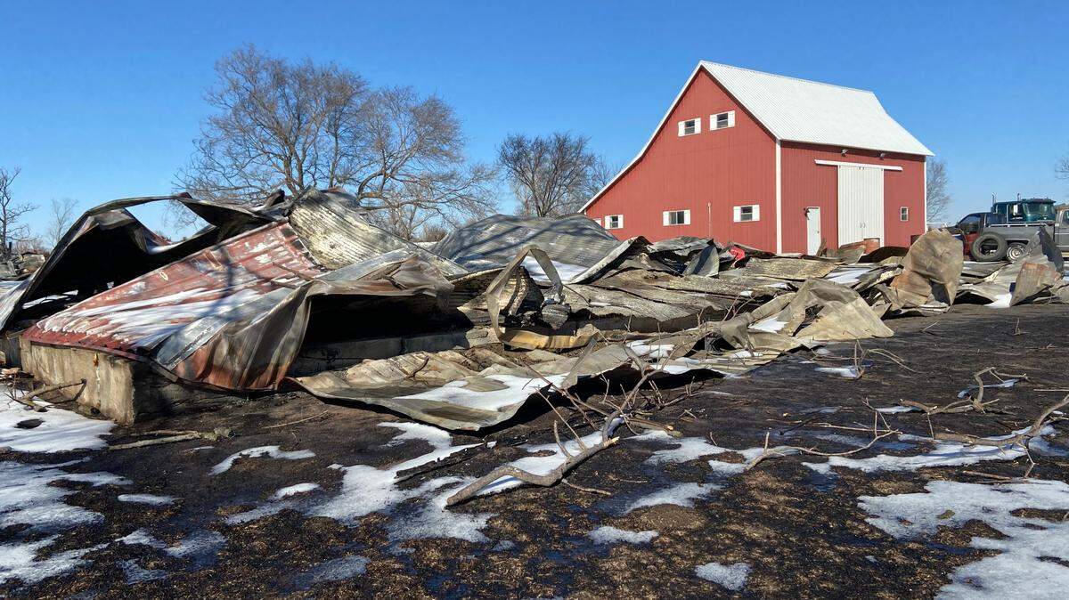 In the foreground is one of Michael Wallsten’s two sheds that were destroyed in the Cottonwood Complex fire. His barn in the background was left untouched.