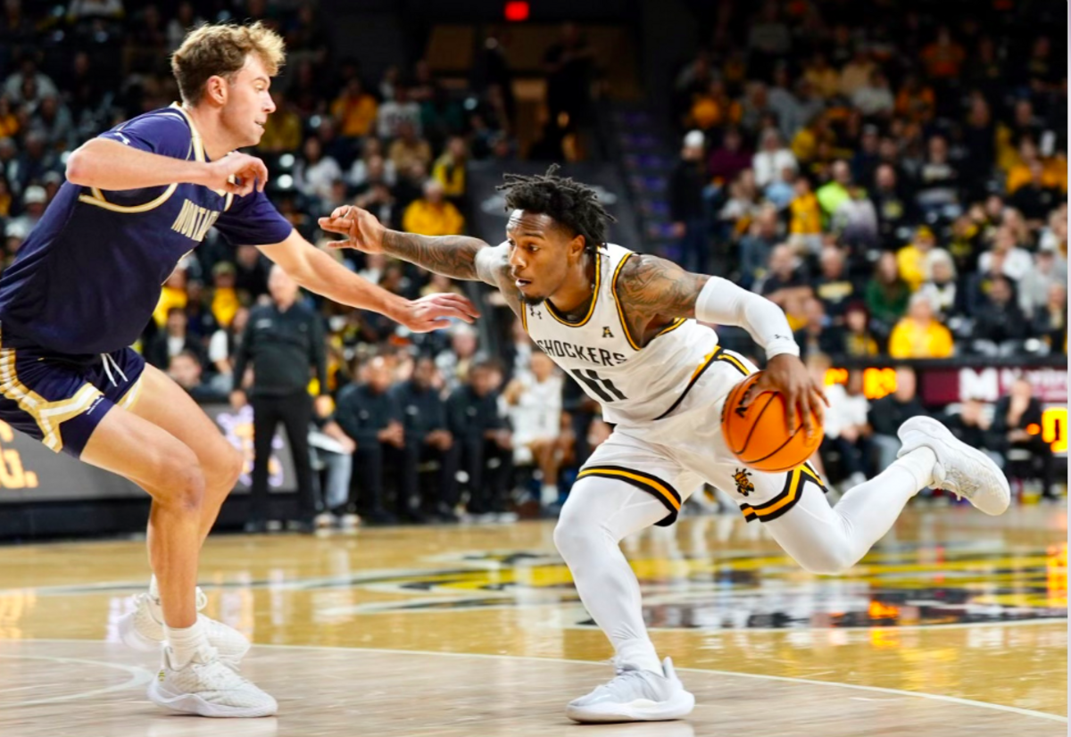 Wichita State point guard Justin Hill attacks a Montana State defender in an 89-69 victory at Koch Arena on Saturday.