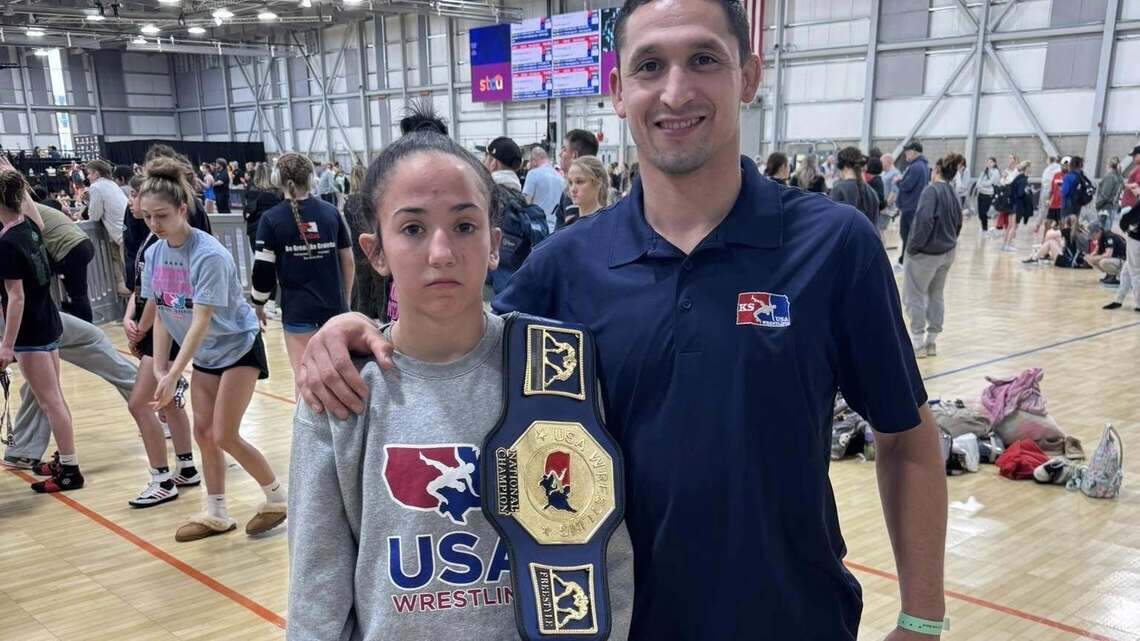 ‘Hardest worker in the room’: Wichita girls wrestler wins national championship