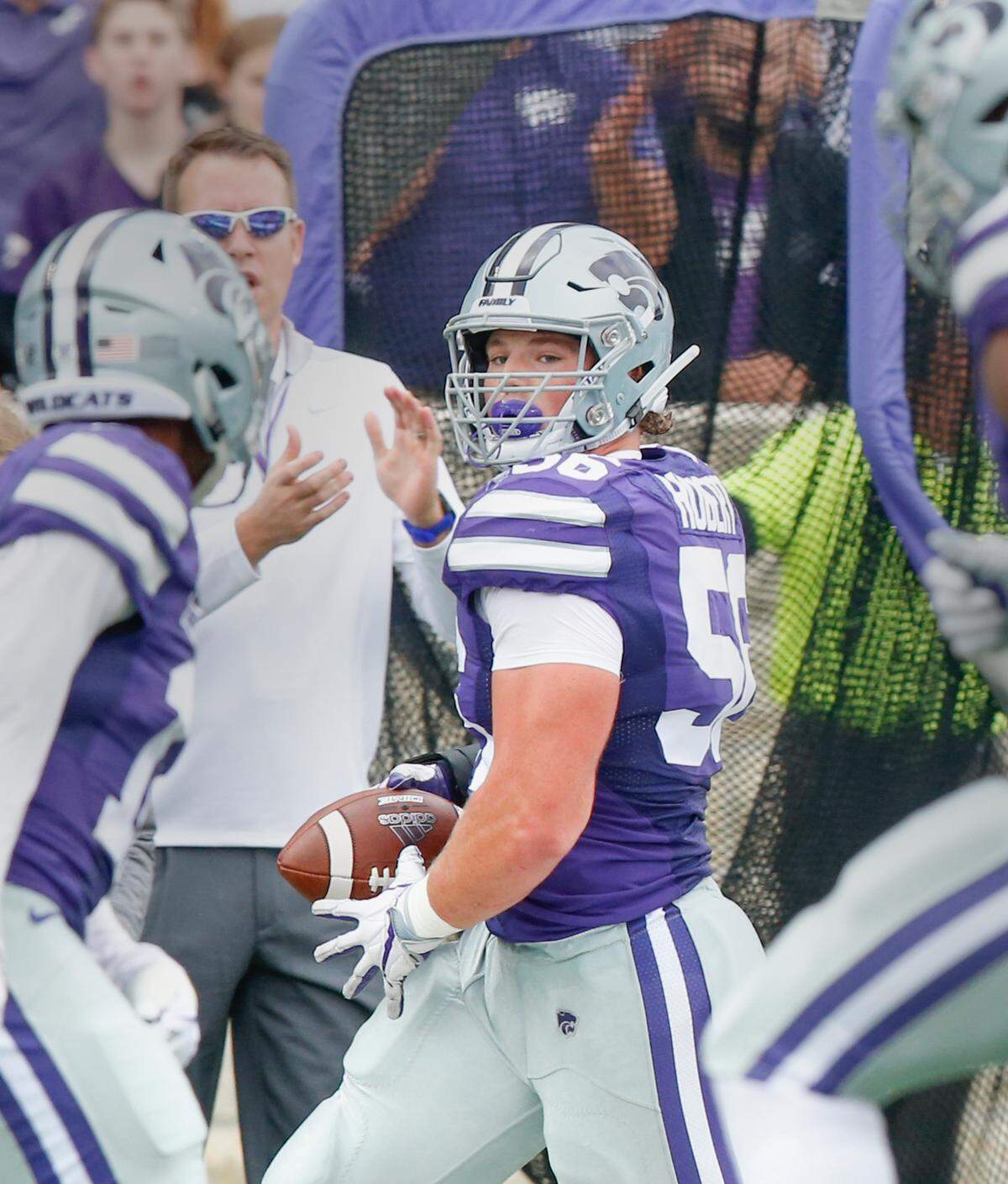Kansas State defensive end Wyatt Hubert (56) after intercepting a DMississippi State quarterback Nick Fitzgerald (7) pass Saturday.(September 8, 2018)