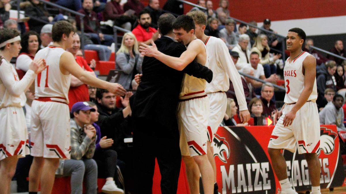 Maize coach Chris Grill and Caleb Grill