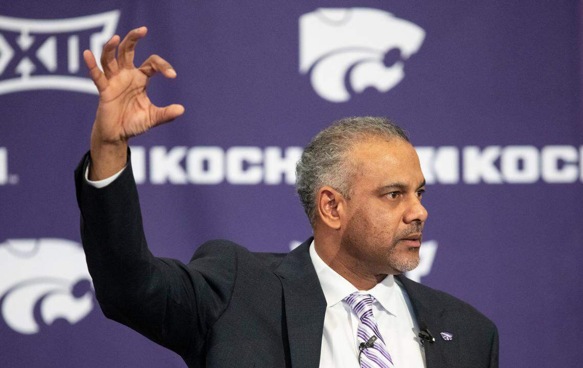 New Kansas State men’s basketball coach Jerome Tang holds up a Wildcat hand symbol during his introductory news conference at Bramlage Coliseum in Manhattan on Thursday. Tang, a long time assistant at Baylor, replaces Bruce Weber, who resigned recently following a string of disappointing seasons.