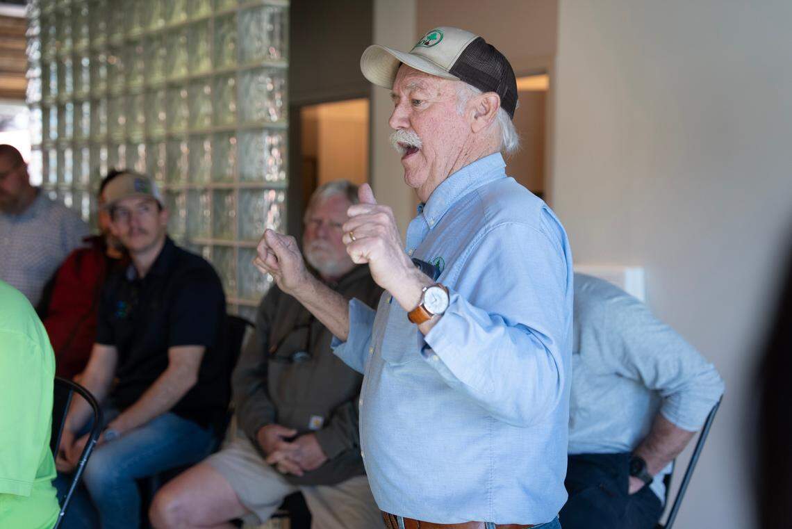 Brady Nursery owner Pat Brady, center, met Tuesday with a group of local nursery owners at Wichita Brewing Company in Delano to discuss the city’s water restrictions.
