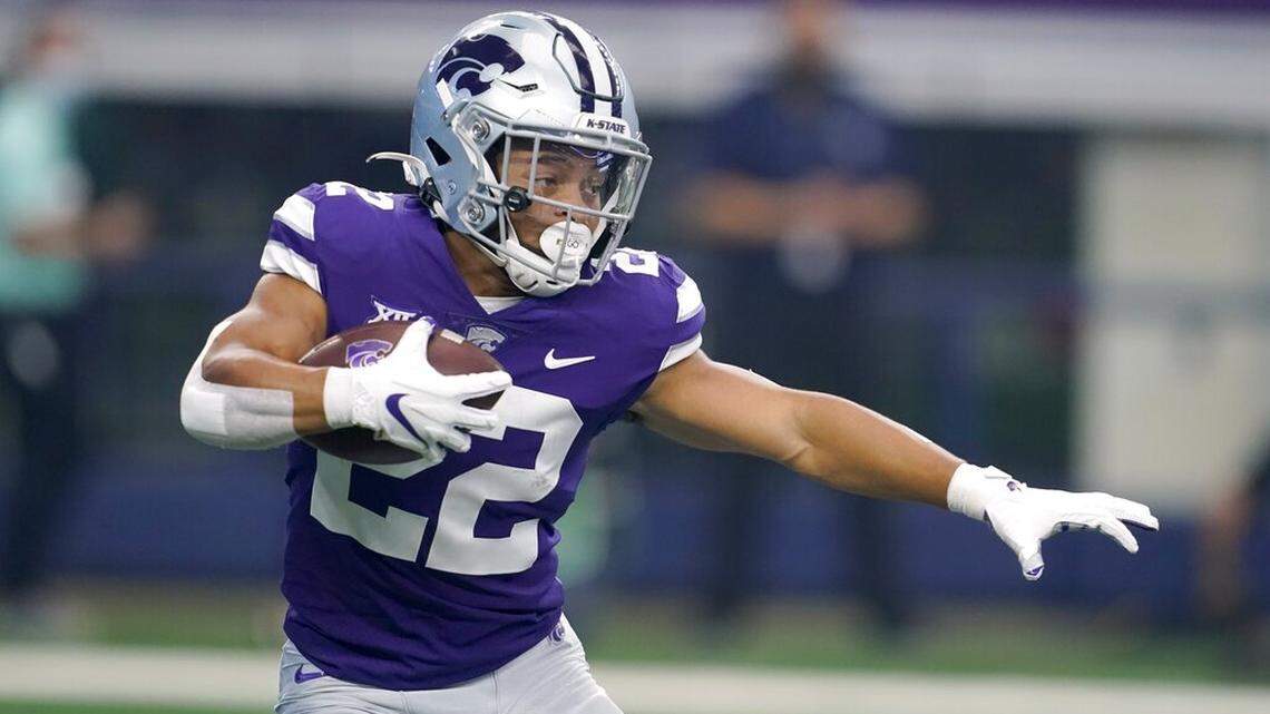Kansas State running back Deuce Vaughn (22) carries the ball in the first half of an NCAA college football game against Stanford in Arlington, Texas, Saturday, Sept. 4, 2021. (AP Photo/Tony Gutierrez)