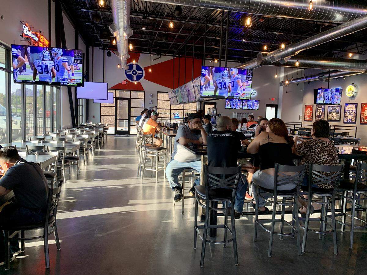 The dining room at Tight Ends has a big, u-shaped bar in the center.