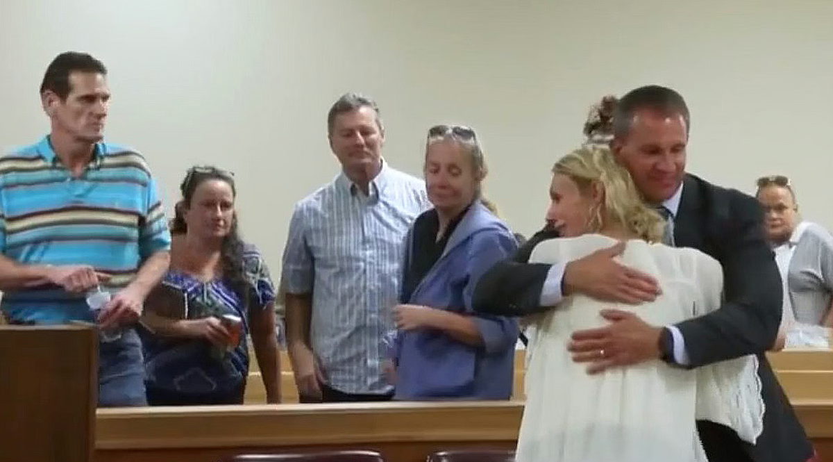 An A&E show this week will share the story of Wellington resident Ashley Pearson, who was charged with second-degree manslaughter for fatally stabbing her boyfriend in 2018. She is shown here hugging her Wichita attorney, Jess Hoeme, after a judge dismissed her case in 2023.
