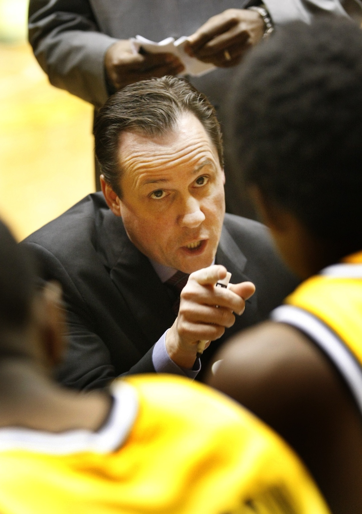 WSU coach Gregg Marshall tells PJ Couisnard to take it strong to the basket before the game with Missouri State Wednesday.