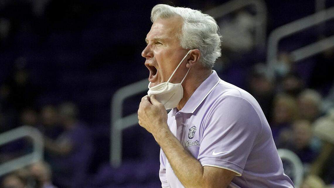 Kansas State head coach Bruce Weber talks to his team during the first half of an NCAA college basketball game against TCU Wednesday, Jan. 12, 2022, in Manhattan, Kan. (AP Photo/Charlie Riedel)