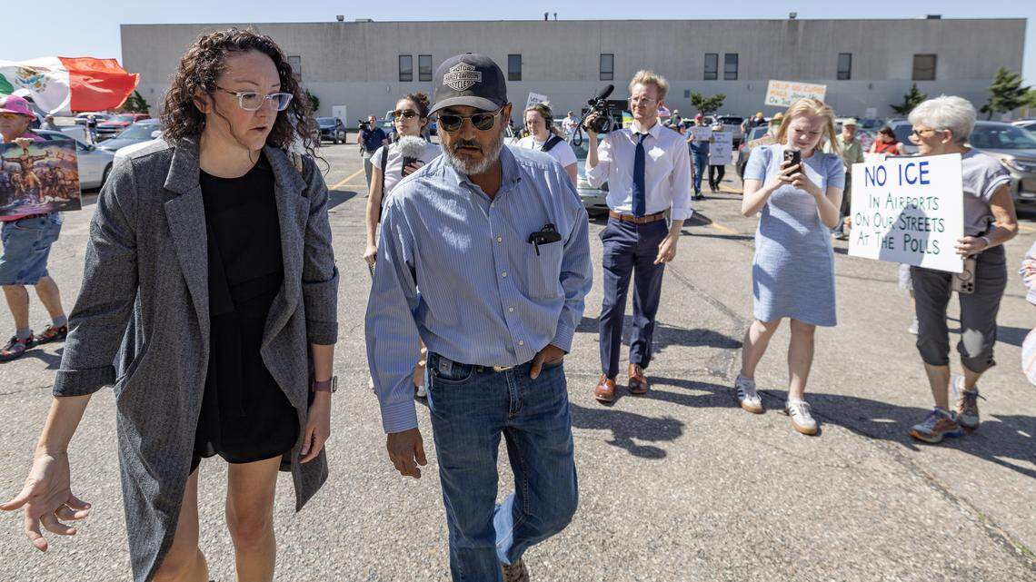 Former Coldwater mayor turns himself in to ICE in front of cameras, friends and protesters