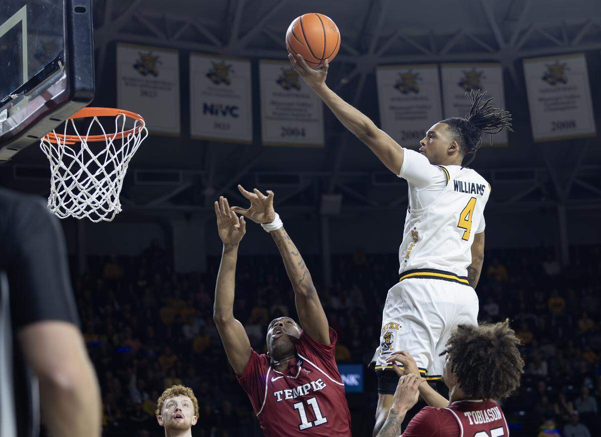 Wichita State’s TJ Williams goes above the basket for a layup during the first half against Temple at Koch Arena.