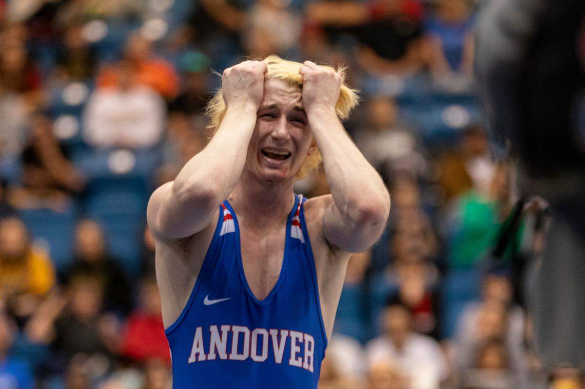 Andover junior Luke Potter celebrates a dramatic, last-second victory in the 132-pound finals at the Class 5A state tournament at Hartman Arena on Saturday.