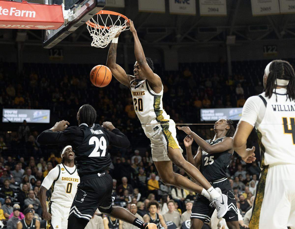 Wichita State’s Emmanuel Okorafor dunks the ball against Milwaukee in Saturday’s win.