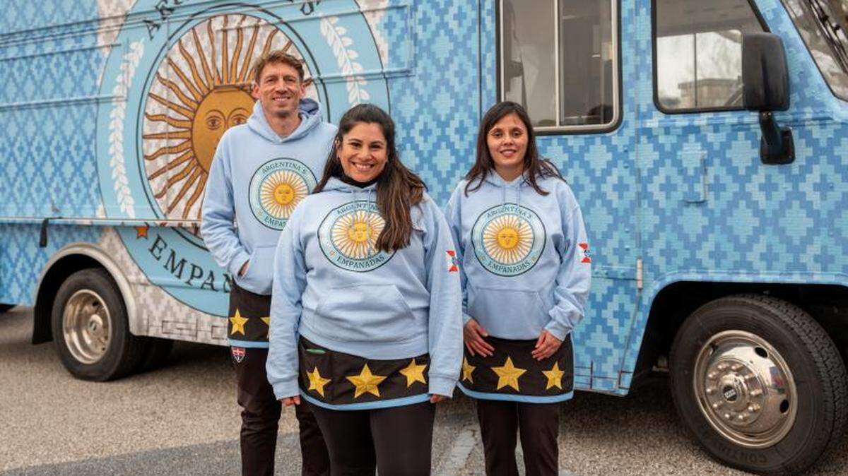 Chad Freeman, left, and his wife Carolina Brandan, center, are the owners of Argentina’s Empanadas, a Wichita business that got third place on the 17th season of “The Great Food Truck Race." Their team was rounded out by Paola Mentis, a friend of the couple and the owner of Wichita Argentinian dessert business Konkeh Artisan Alfajor Pastries 