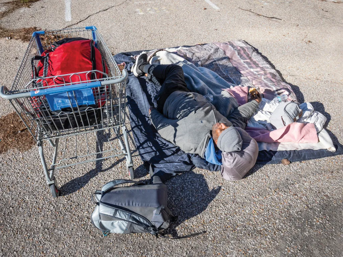 On a late December day last year, Thomas Gloster unrolled his sleeping bag and sacked out in a downtown Wichita parking lot. Gloster, who’s from Oakland, California, had been homeless for two years when this photo was taken.