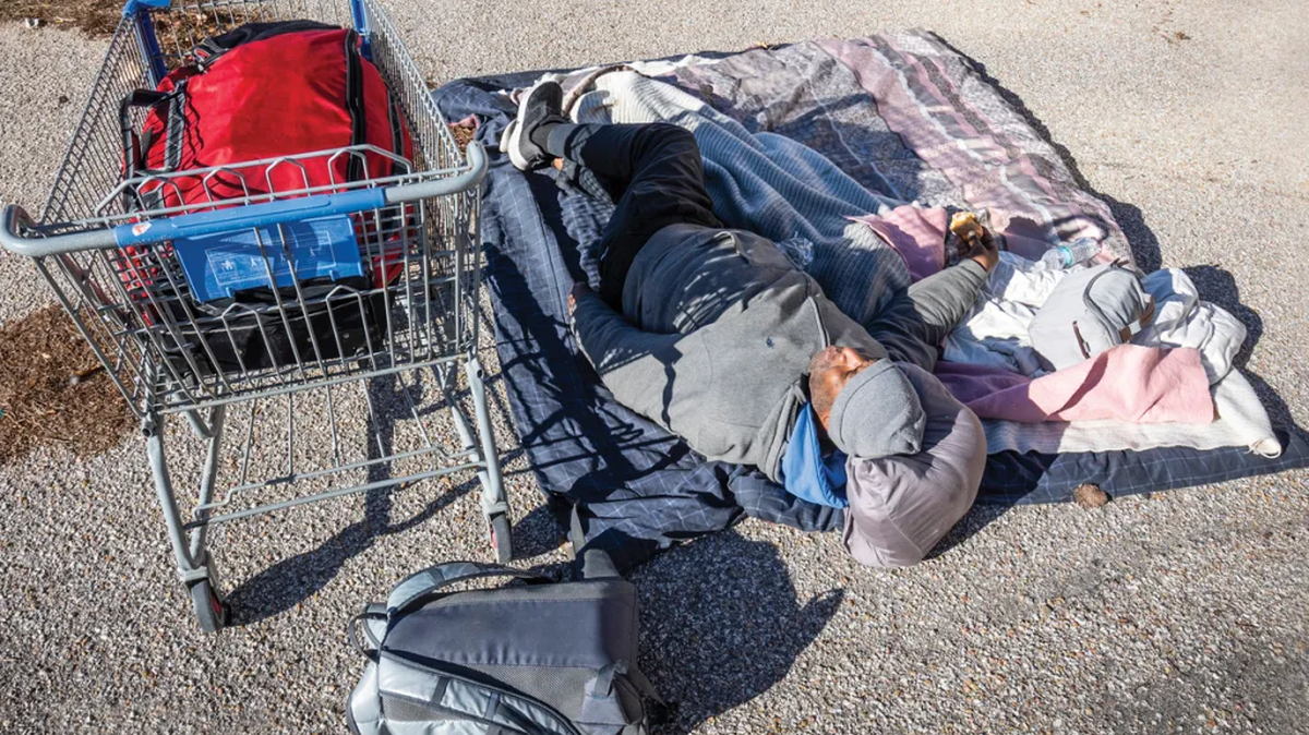 On a late December day last year, Thomas Gloster unrolled his sleeping bag and sacked out in a downtown Wichita parking lot. Gloster, who’s from Oakland, California, had been homeless for two years when this photo was taken.