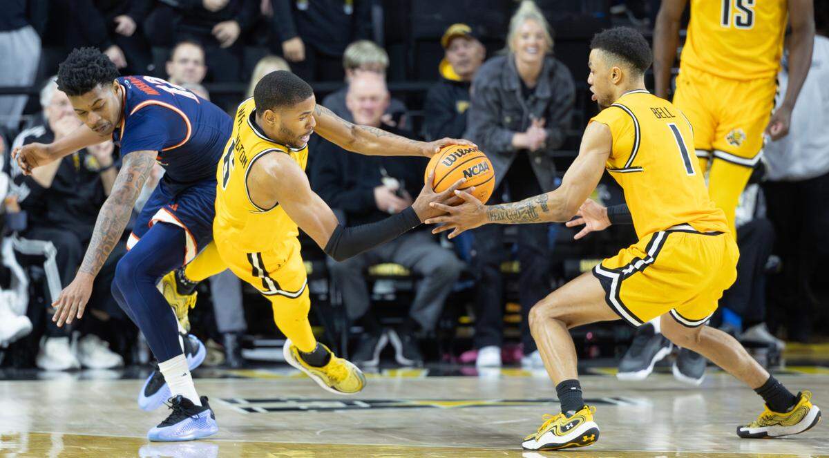 Corey Washington fights to secure a rebound during the second half of their game against UTSA on Wednesday night. 