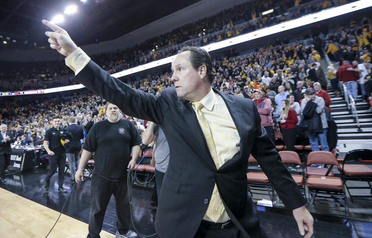 Wichita State coach Gregg Marshall acknowledges the crowd after his team beat Oklahoma 80-75 at Intrust Bank Arena.