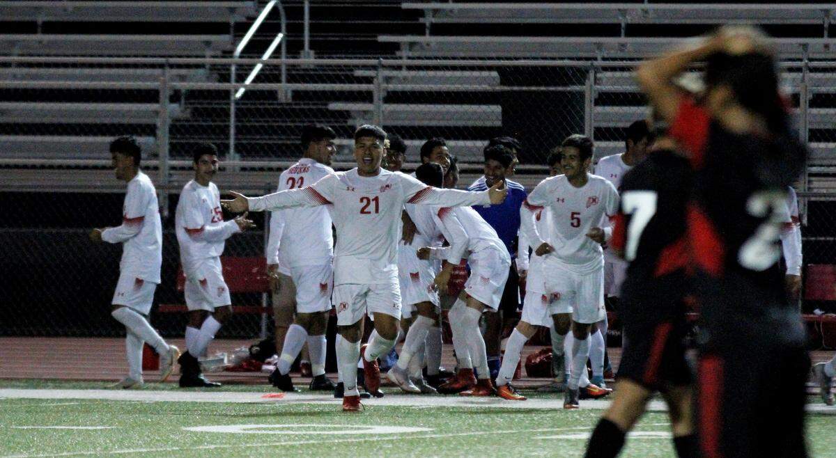 Wichita North’s David Lopez celebrates his goal against Wichita Heights in the Redskins’ 3-1 win Tuesday.