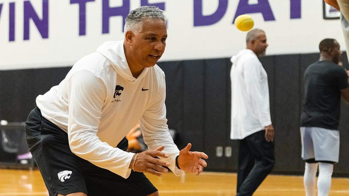 Kansas State basketball director of strategies Kevin Sutton helps coach players during a practice in Manhattan, Kansas.