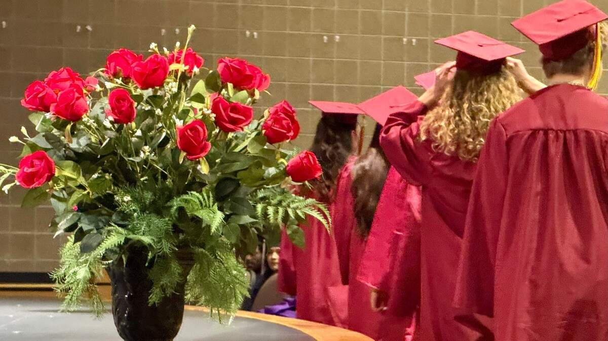 Summer graduates from Wichita West High School march into their commencement ceremony in June 2025.
