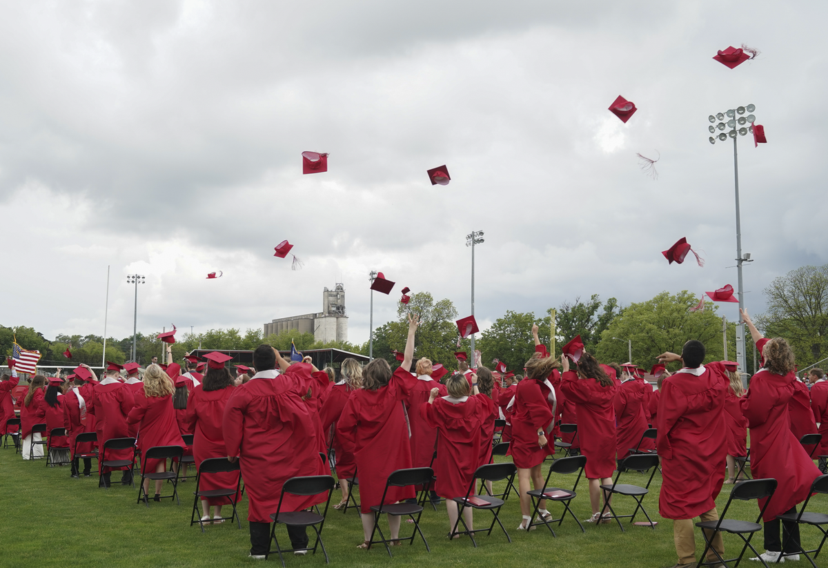 The Wellington High School class of 2021, at graduation in May. The Wellington district is suspending all school-related activities until Sept. 7 because of COVID-19, derailing academics and extracurriculars.