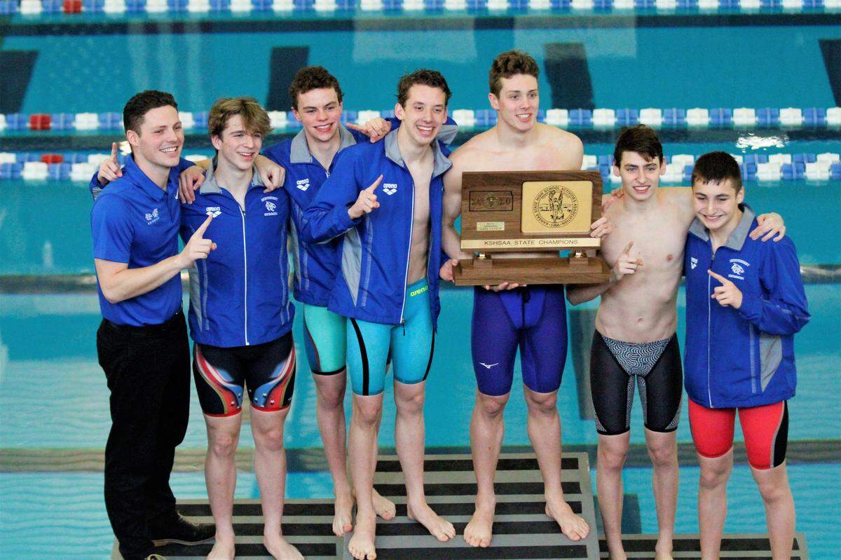 Wichita Independent state championship boys swimming and diving team (left to right): Coach Mitchell Wagner, junior Joshua Jacobsen, sophomore Matthew Janssen, senior Edward Sturm, senior Aidan Scott, junior George Jekov and sophomore Daniel Jekov.