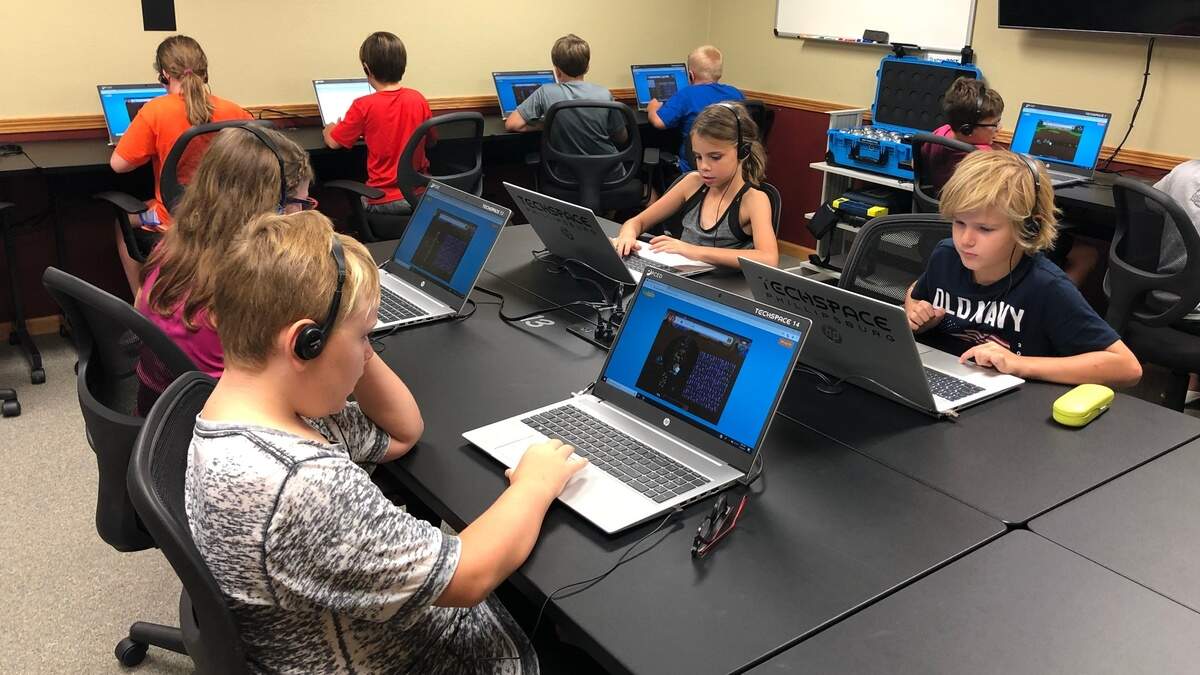Students in Phillipsburg, Kansas use a new computer lab that opened before the pandemic. This photo was taken in 2019. It has 25 workstations with self-guided curriculum for computer science and coding.