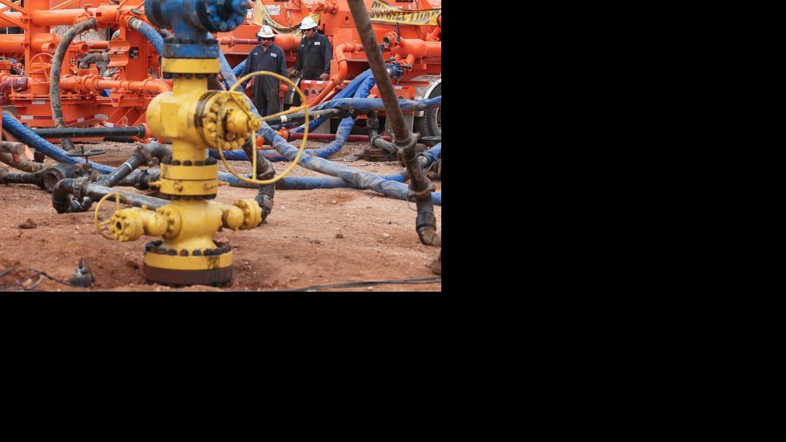 Crews use the fracking process in 2011 on a deep well that runs a mile underground near Medicine Lodge.

