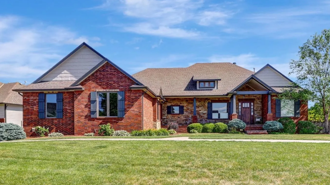Looking for a lake house complete with dock in Wichita? See inside $1M listing