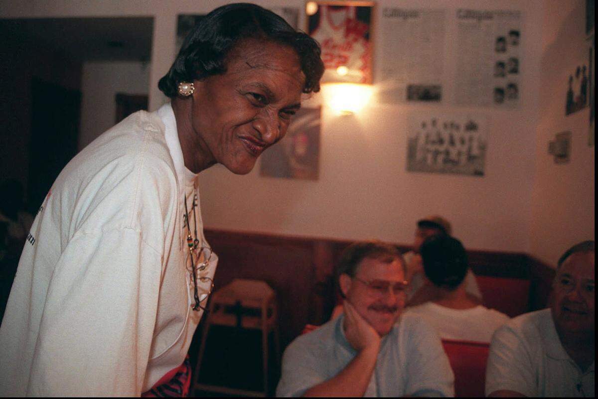The late Ahnawake Love in her Mama Love’s Kitchen, which opened in Old Town in 1998 before closing about three years later. Her grandson, Adrian Love, is now opening Love & Co. Kitchen & Cocktails in the former Donut Whole space, in part to revive some of what Mama Love’s offered.