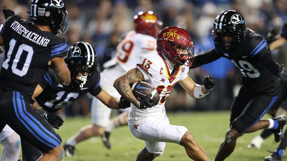 Iowa State Cyclones wide receiver Jaylin Noel (13) returns a kickoff against the Brigham Young Cougars in the second quarter at LaVell Edwards Stadium.