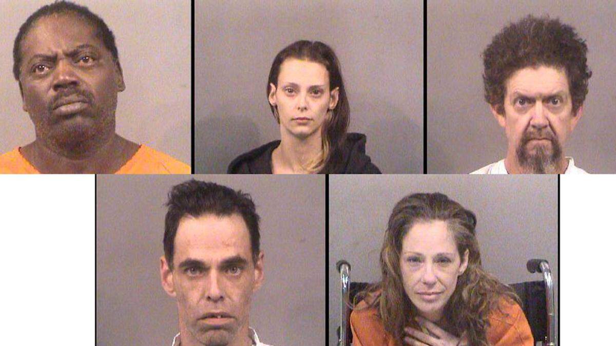 Five people were charged in connection with the disappearance and torture killing of 33-year-old Scottie Goodpaster. They are, clockwise from top left: Willie E. Morris, Alexandria Scott, Jeff Hillard, Brian Bussart and Heidi Hillard.