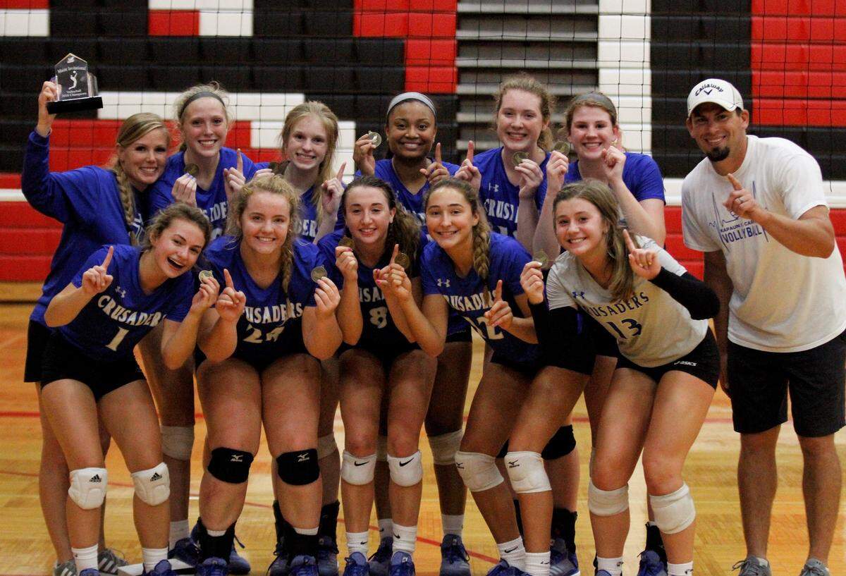 Kapaun poses for a photo-op after winning the 2018 Maize Invitational in three sets over Maize South on Saturday. (Sept. 15, 2018)