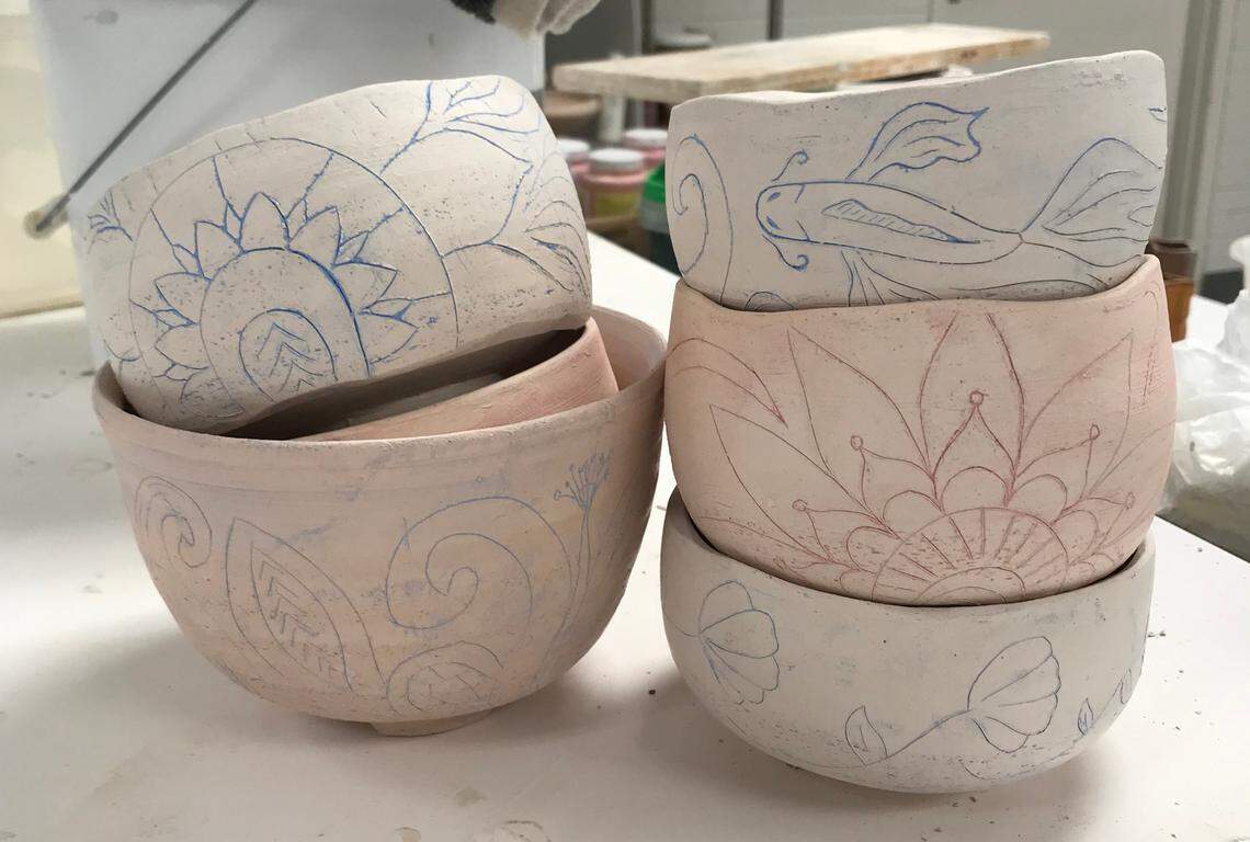 Wichita State student and member of the WSU Ceramics Guild Emma Glover created bowls to donate to the Empty Bowls Wichita event. She decorated her bowls using an inlay process, a ceramic surface decoration technique that involves cutting into a piece of clay and filling the incisions with clay or ceramic stains.