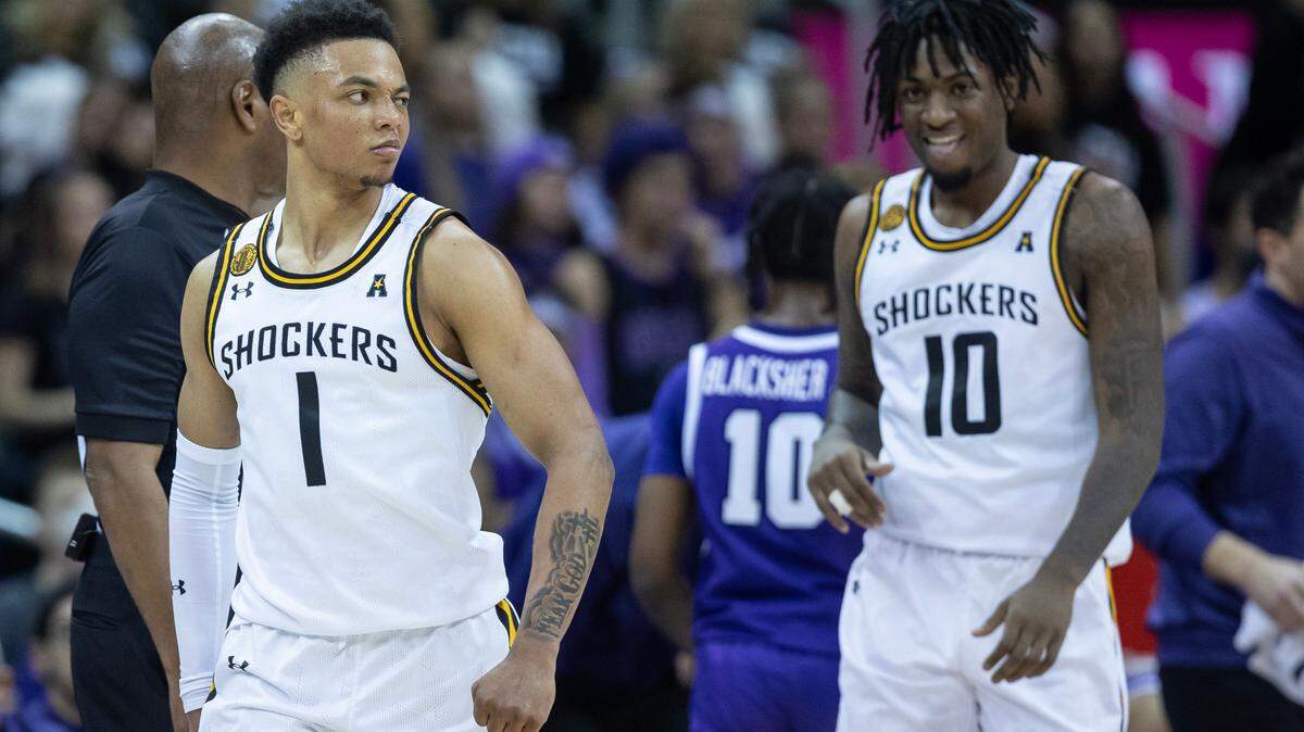 Wichita State’s Xavier Bell flexes during a timeout during the second half of the Hall of Fame Classic in Kansas City on Monday against Grand Canyon University.
