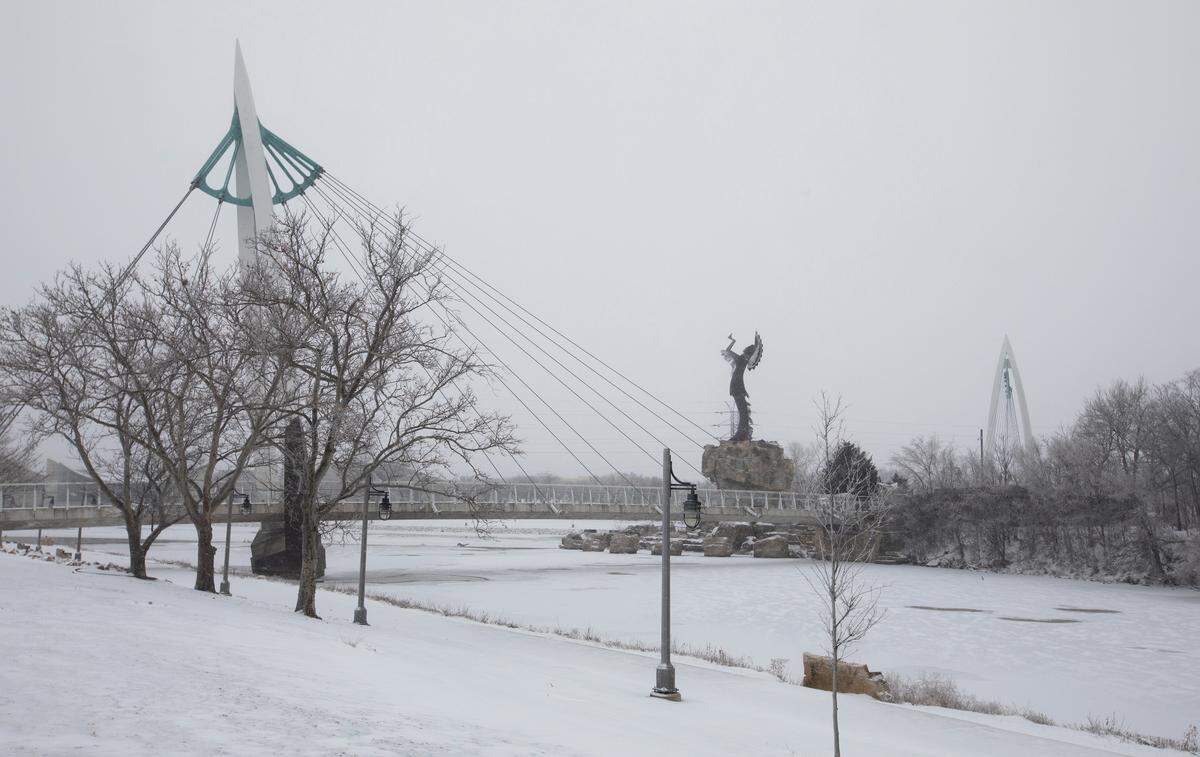 The Keeper of the Plains covered in snow in 2021. The average winter temperature across the continental U.S. has warmed 3 degrees Fahrenheit, since preindustrial levels, according to the EPA. This has resulted in reductions in snowfall and shorter ice seasons.