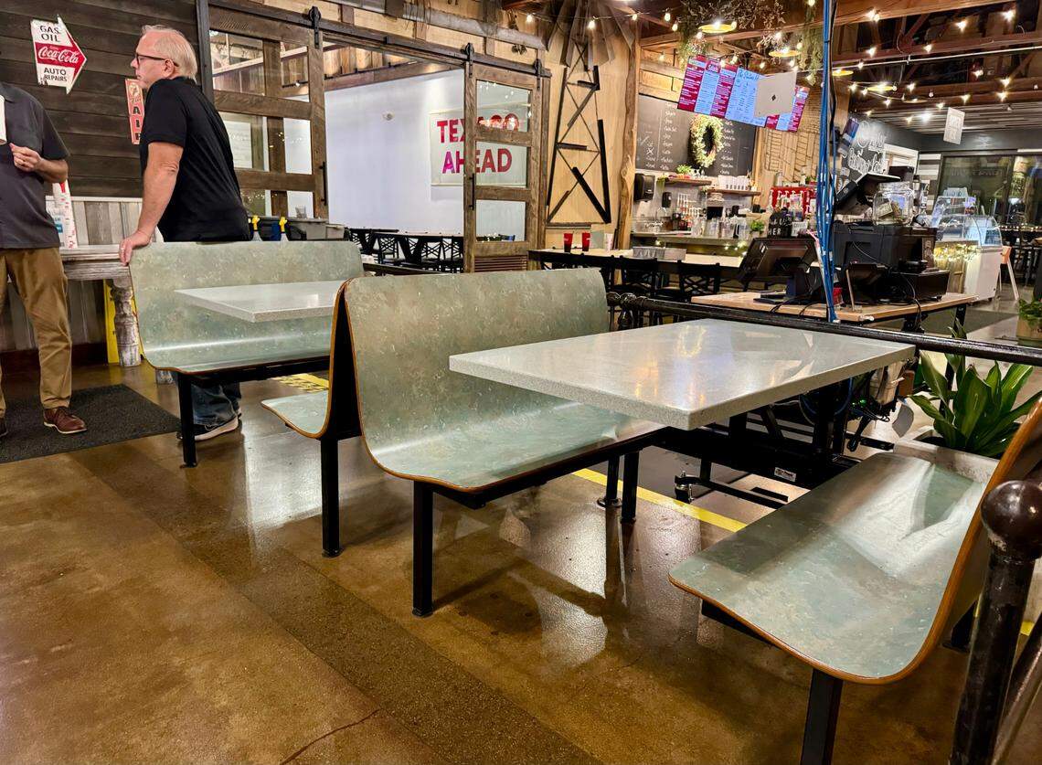 A set of booths that were part of the old Moundridge gas station that became The Hub Bruck Oven & Brewery were left in place in the new restaurant.